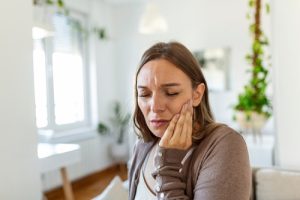 woman with jaw pain